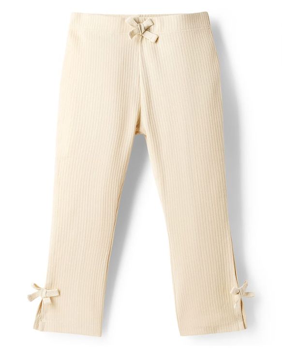Babyhug Lycra Knit Full Length Striped Leggings With Bow Applique - Beige