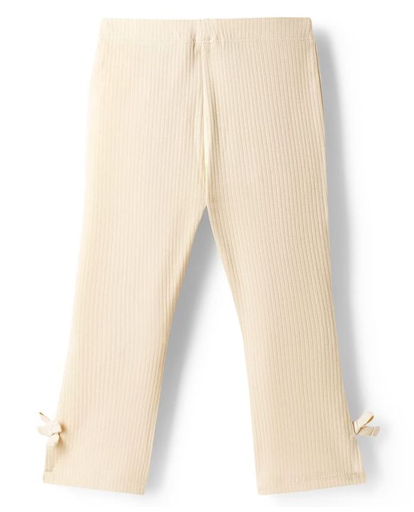 Babyhug Lycra Knit Full Length Striped Leggings With Bow Applique - Beige