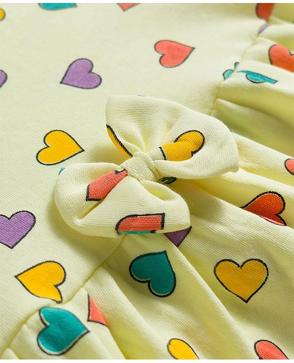 Babyhug 100% Cotton Knit Half Sleeves Hearts Printed Frock With Bow Applique - Yellow