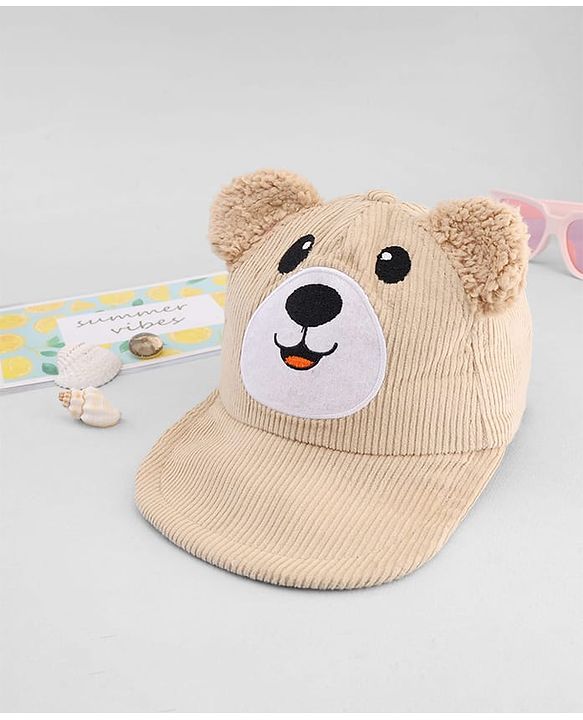 Babyhug Corduroy Woven Baseball Cap With Face Embroidery & Ear Applique Beige - Diameter 15 cm