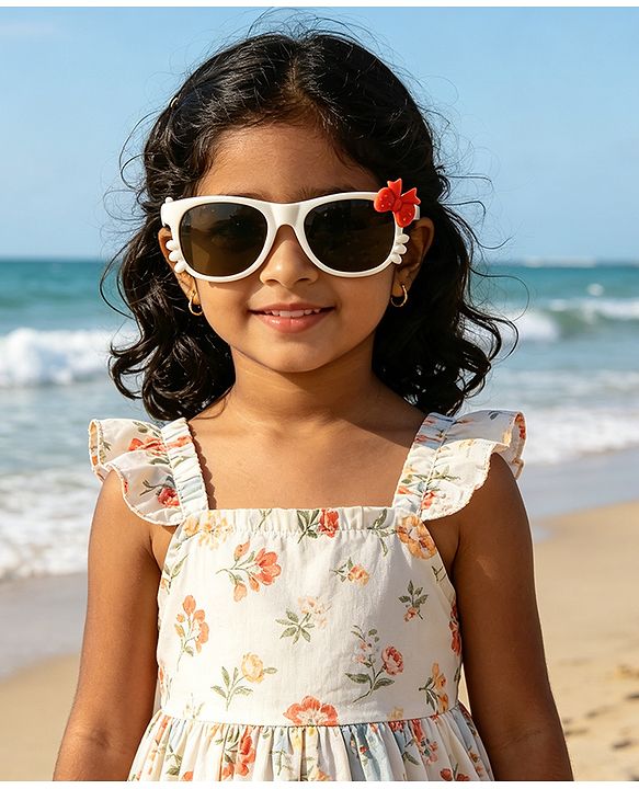 Babyhug Solid Coloured Sunglasses With Bow Design - Beige