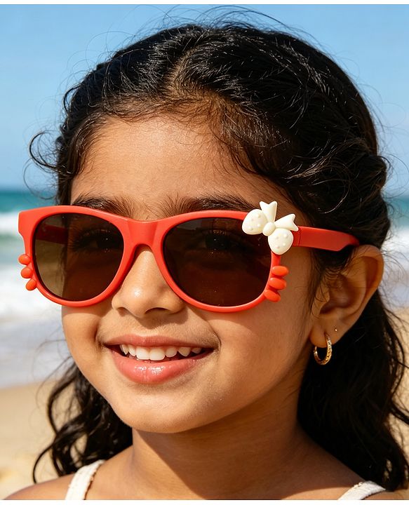 Babyhug Solid Coloured Sunglasses With Bow Design - Beige