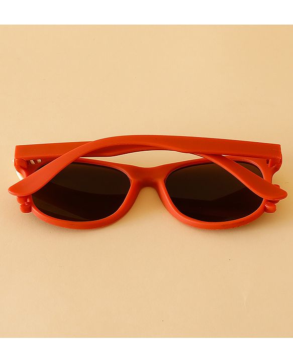 Babyhug Solid Coloured Sunglasses With Bow Design - Beige
