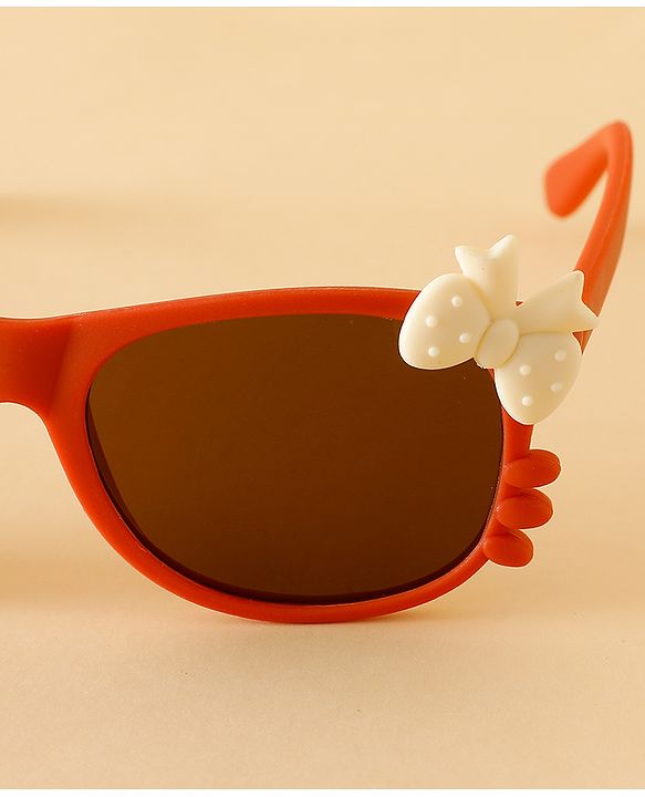 Babyhug Solid Coloured Sunglasses With Bow Design - Beige