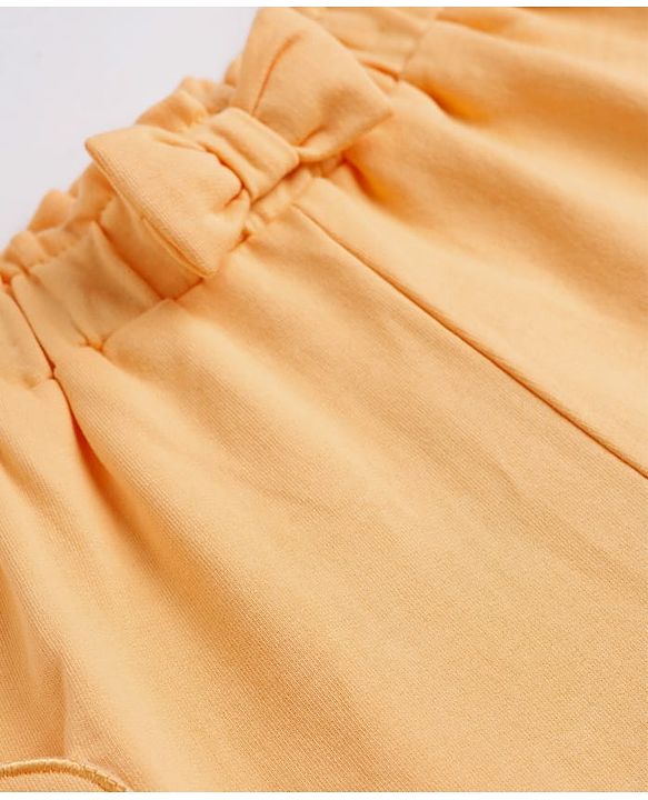 Babyhug Terry Knit Mid Thigh Shorts With Heart Embroidery & Bow Applique - Peach