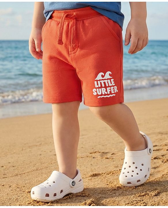 Babyhug Terry Knit Mid Thigh Length Shorts with Little Surfer Print - Red
