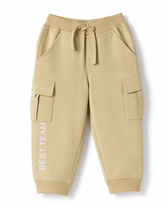 Babyhug Cotton Terry Knit Full Length Solid Lounge Pant with Cargo Pockets & Best Team Text Print - Cream