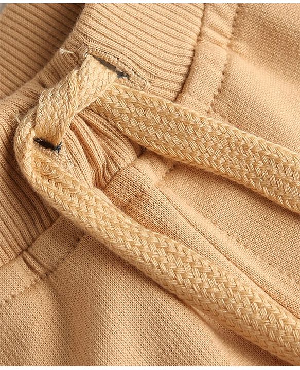 Babyhug Cotton Terry Knit Track Pant with Explore Text & Cargo Pocket in Cream