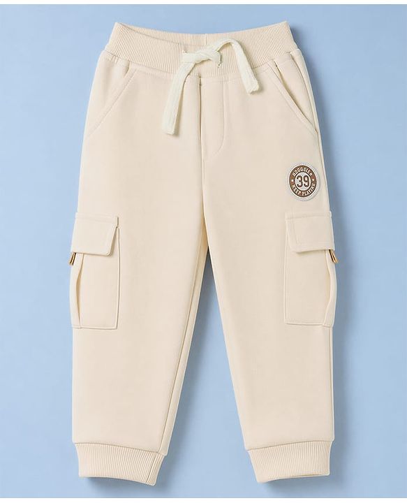 Babyhug Cotton Terry Knit Solid Lounge Pant with Cargo Pocket in Cream