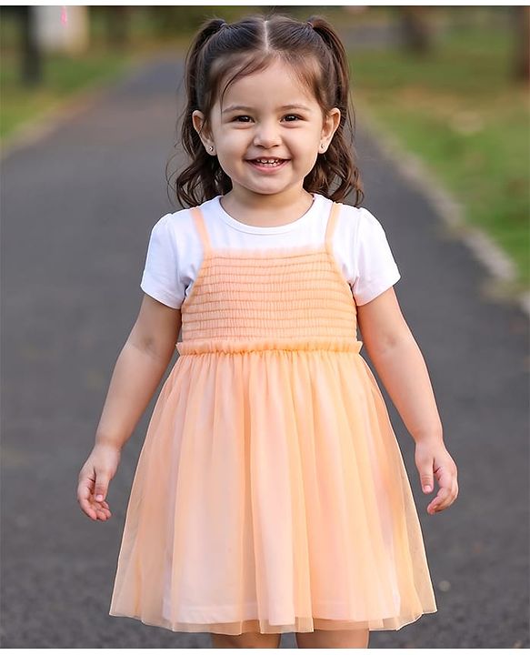 Babyhug Nylon Knit Frock with Inner Tee, Half Sleeves, Round Neck, Smocked Bodice Peach 9-12 Months
