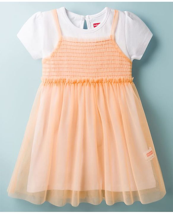 Babyhug Nylon Knit Frock with Inner Tee, Half Sleeves, Round Neck, Smocked Bodice Peach 9-12 Months