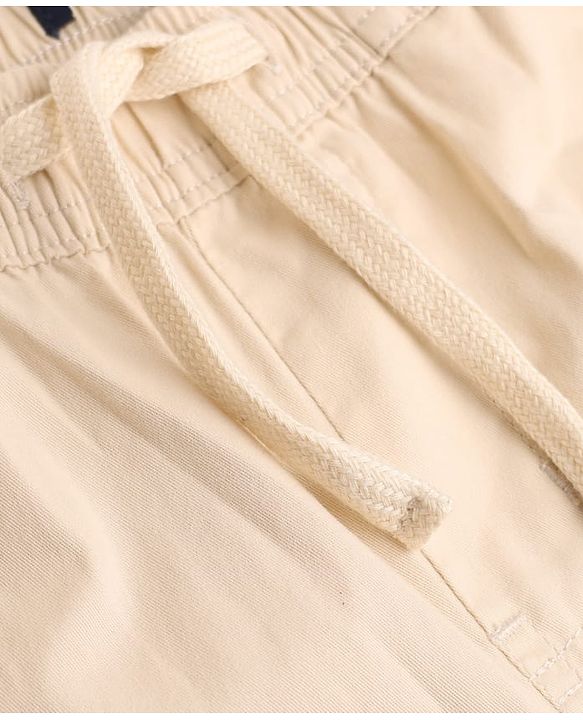 Pine Kids Cotton Elastane Woven Full Length Solid Trouser in Beige