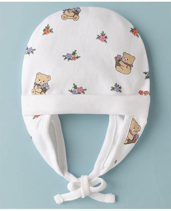 Babyhug 100% Cotton Interlock Knit Ear Flap Cap With Teddy Bear & Flora L Print White - Diameter 14.5 cm