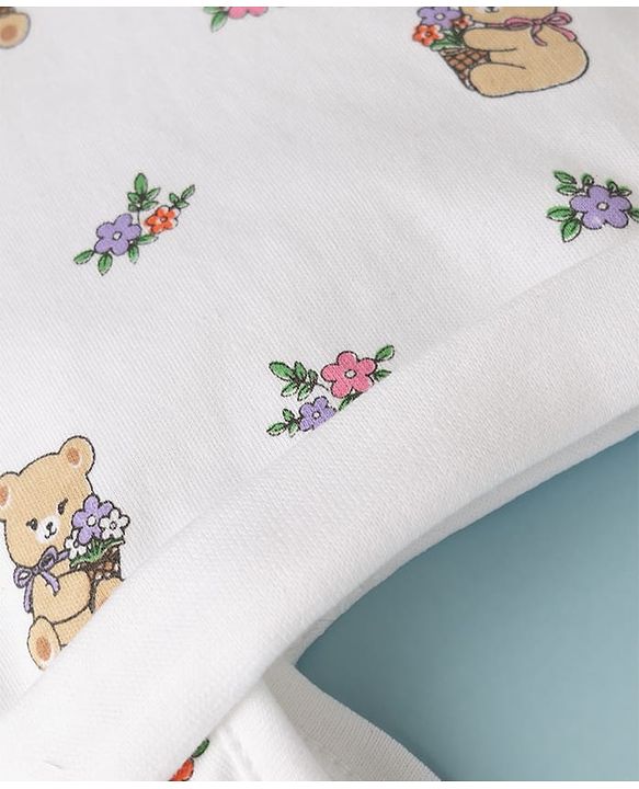 Babyhug 100% Cotton Interlock Knit Ear Flap Cap With Teddy Bear & Flora L Print White - Diameter 14.5 cm