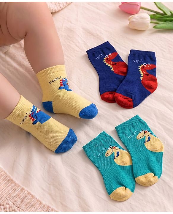 Cute Walk by Babyhug Non Terry Knit Anti-Bacterial Ankle Length Socks With Dino & Text Design Pack of 3 - Beige, Green & Navy Blue