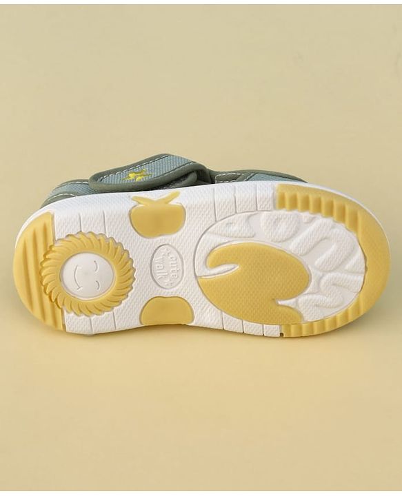 Cute Walk by Babyhug Velcro Closure Printed Musical Sandal With Vehicles & Dino Applique - Olive Green