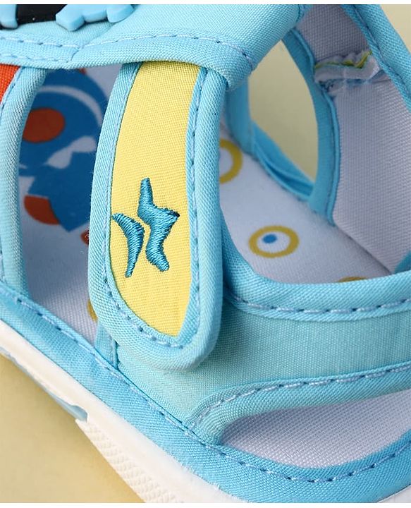 Cute Walk by Babyhug Velcro Closure Musical Sandal With Penguin Applique - Light Blue