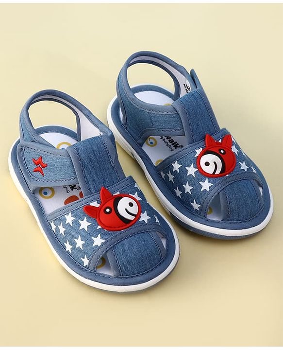 Cute Walk by Babyhug Velcro Closure Musical Sandal With Star Print & Fish Applique - Blue