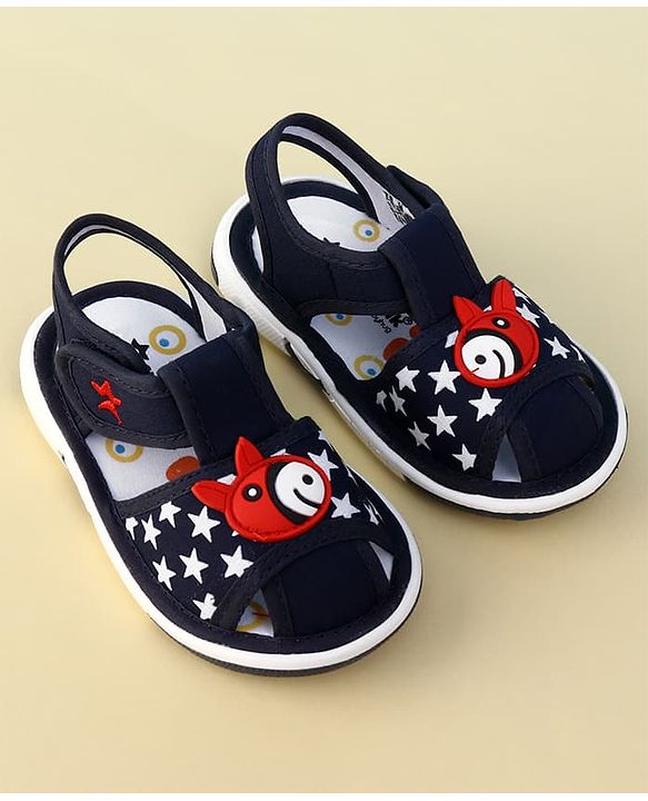 Cute Walk by Babyhug Velcro Closure Musical Sandal With Star Print & Fish Applique - Blue