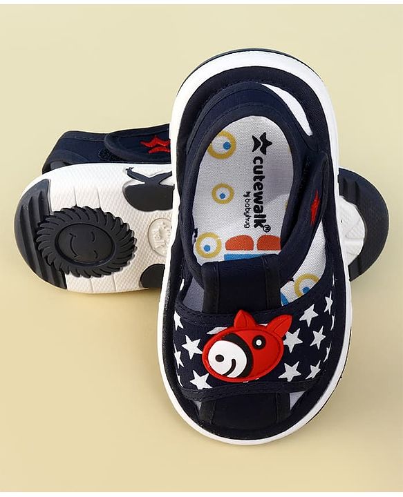 Cute Walk by Babyhug Velcro Closure Musical Sandal With Star Print & Fish Applique - Blue