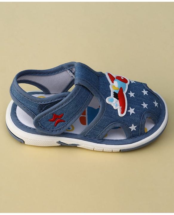 Cute Walk by Babyhug Velcro Closure Musical Sandal With Star  Print & Aeroplane Applique - Blue