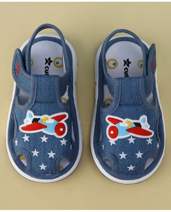 Cute Walk by Babyhug Velcro Closure Musical Sandal With Star  Print & Aeroplane Applique - Blue