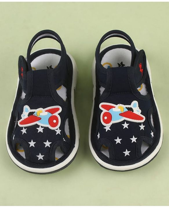 Cute Walk by Babyhug Velcro Closure Musical Sandal With Star  Print & Aeroplane Applique - Blue