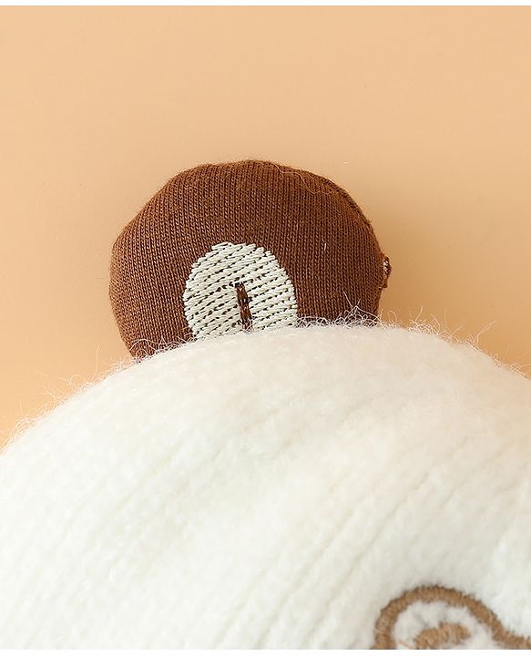 Babyhug Woollen Pom Pom Cap With Bear Design Off White - Diameter 9 cm