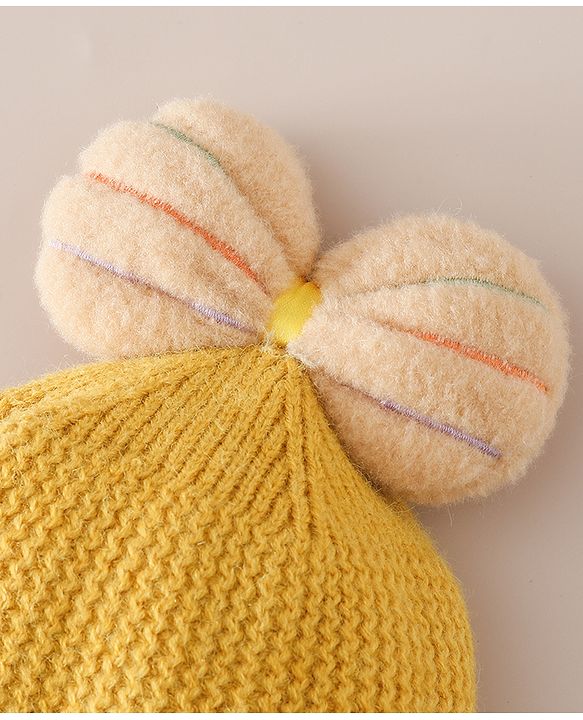 Babyhug Woollen Cap With Floral Applique Bow On Top Yellow - Diameter 9 cm