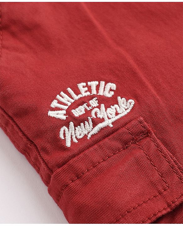 Babyhug Twill Woven Comfort Fit Above Knee Length Bermuda with Athletic Dept. of New York Embroidery in Maroon