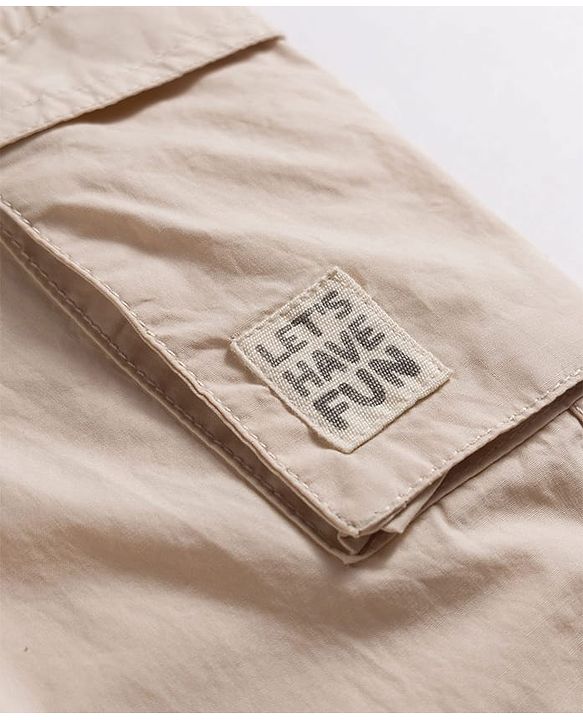 Babyhug Poplin 100% Cotton Woven Full Length Trousers with Text Patch & Cargo Pockets - Beige