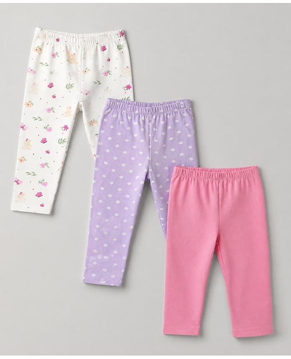 Babyhug Cotton Lycra Elastane Knit Slim Fit Full Length Solid Leggings with Floral & Polka Dots Print Pack of 3 - White, Lilac & Pink