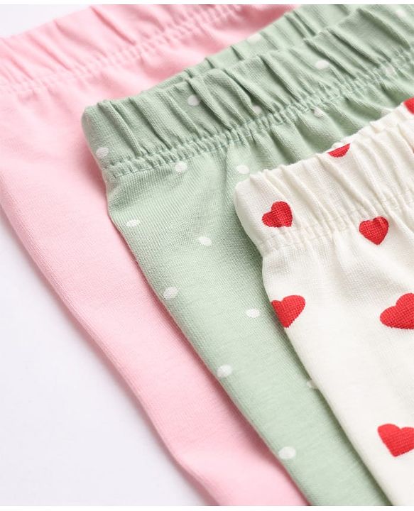 Babyhug Cotton Lycra Elastane Knit Slim Fit Full Length Solid Leggings with Hearts & Polka Dots Print Pack of 3 - Peach, Baby Pink & Light Green