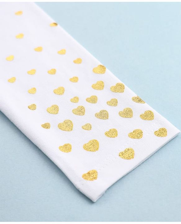 Babyhug Cotton Elastane Knit Full Length Solid Leggings With Heart Print - White