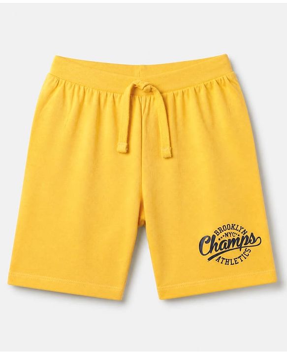 Babyhug 100% Cotton Knit Mid Thigh Shorts with Brooklyn Nyc Champs Athletics Print in Yellow for 5-6 Years