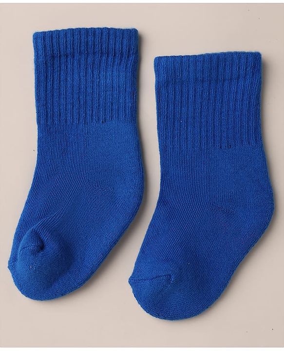 Cute Walk by Babyhug Knit Calf Length Anti Bacterial Solid Socks Pack of 3 - White, Black & Blue