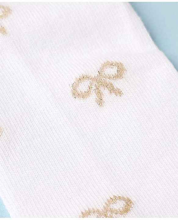 Cute Walk by Babyhug Cotton Knit Anti Bacterial Full Length Tight With Bow Design - White