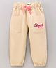 Vitamins Ankle Length Track Pants Placement Print Solid- Beige
