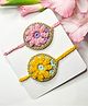 Bobbles & Scallops Set Of 2 Crochet Flower Rakhi - Pink & Yellow