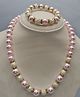Little Blossom Glossy Finish Pearl And Diamond Necklace Bracelet Set - Light Pink