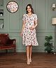 MomToBe Half Sleeves Seamless Floral Printed Flared Maternity Dress With Concealed Zipper Nursing Access - Cream