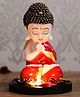 eCraftIndia Praying Red Monk Buddha with Wooden Base, Fragranced Petals and Tealight