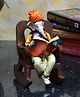 eCraftIndia Lord Ganesha reading Book on Wooden Chair
