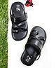 The Madras Trunk Strap Detailed Sandals - Black