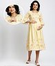 Dummy Shape Three Fourth Bell Sleeves Floral Printed Maternity Flared Kurta With Attached Belt & Concealed Zipper Nursing Access - Yellow