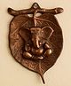 eCraftIndia   Brown Metal Lord Ganesha On Leaf Wall Hanging
