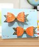 NYRA DESIGN STUDIO Set Of 2 Bow Designed Shimmered Hair Clips - Orange & Golden