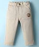 Babyhug Cotton Lycra Woven Full Length Solid Coloured Trouser With Stretch & Animal Patch - Beige