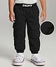 Babyhug Woven Full Length Solid Colour Parachute Pant - Black