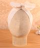 KIDLINGSS Cotton Schiffli Embroidered Bow Applique Detailed Turban Cap - Beige